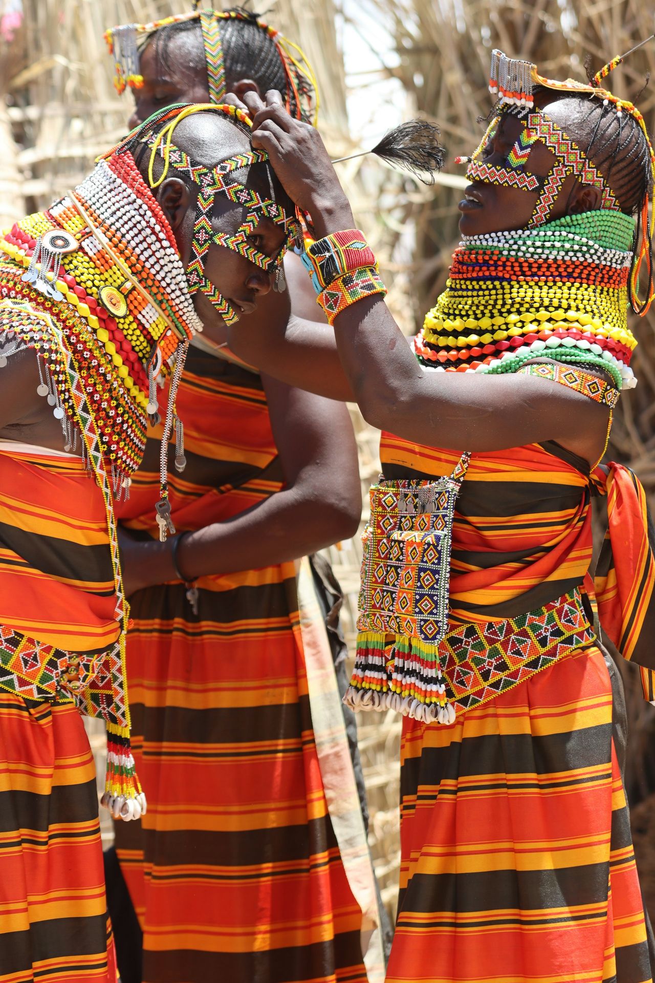 a couple of women standing next to each other